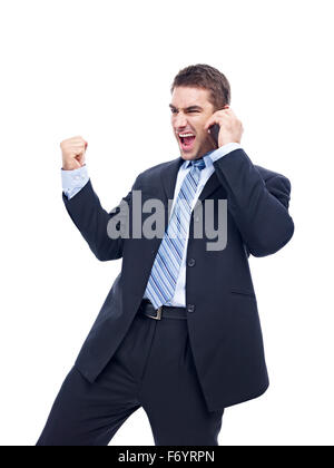 caucasian business person talking on cellphone, excited, rejoicing Stock Photo