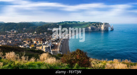 Falaise d'Amont cliff and Etretat city, Normandy, France Stock Photo