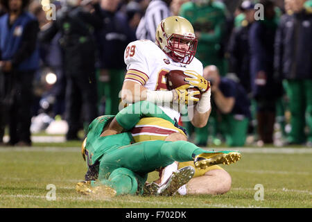 Fenway Park, Massachusetts, USA. 21st November, 2015.  Boston College Eagles tight end Tommy Sweeney (89) is tackled after catching a pass during the NCAA football game between the Boston College Eagles and Notre Dame Fighting Irish at Fenway Park. Notre Dame won 19-16. Anthony Nesmith/Cal Sport Media/Alamy Live News Stock Photo