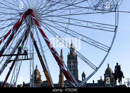 Glasgow, UK. 22nd November, 2015. As a start to the festive season  many people began their Christmas shopping in Buchanan Street, Glasgow - also known as Glasgow's Style Mile. To add to the seasonal festivities, while George Square was being decorated, Glasgow City Council organised a Xmas Carnival of over 400 musicians, dancers and actors in fancy dress, in a city centre procession after performing in the Style Mile. Credit:  Findlay/Alamy Live News Stock Photo