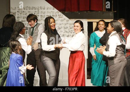 American Canyon, CA, USA. 19th Nov, 2015. Mr. Fezziwig, played by Kezia Warioba, center left, and Mrs. Fezziwig, played by Ashley McLeod, dance during the scene of Fezziwigs Ball, during the dress rehearsal of A Christmas Carol at American Canyon High School on Thursday. © Napa Valley Register/ZUMA Wire/Alamy Live News Stock Photo