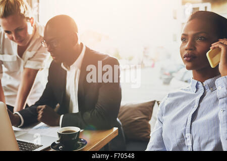 Group of ethnic business people working, young entrepreneurs, multi ethnic. Stock Photo