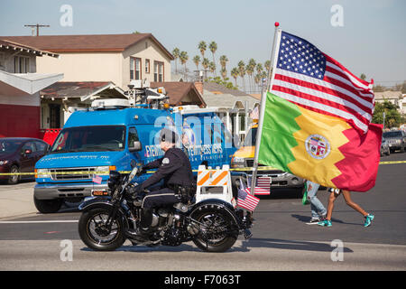 Los Angeles, California, USA, January 19, 2015, 30th annual Martin Luther King Jr. Kingdom Day Parade,vintage motorcycle policeman with US and LA City Flag Stock Photo