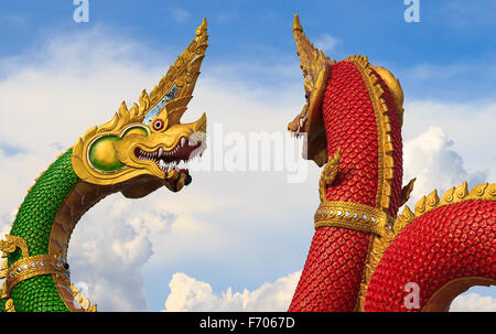 Serpent king or king of naga statue on blue sky in thailand Stock Photo