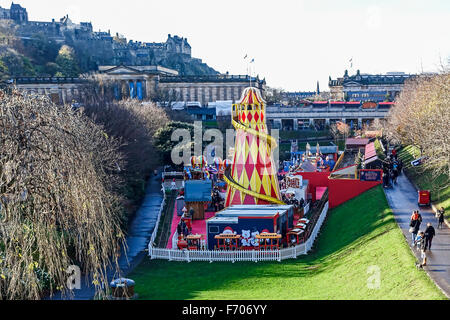 Edinburgh Christmas market 2015 in East Princes Gardens Edinburgh with Santa Land and steam train passing by Stock Photo