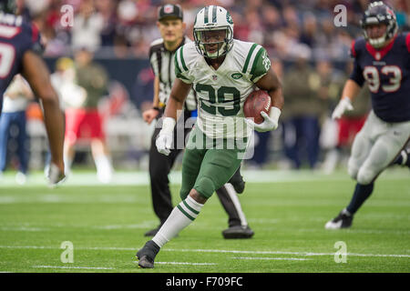 New York Jets quarter back Richard Todd holds the ball high in the