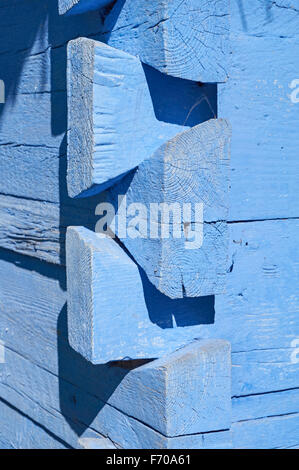 Wooden details of old traditional peasant cottage in Poland. Blue wooden peasant farmhouse Stock Photo