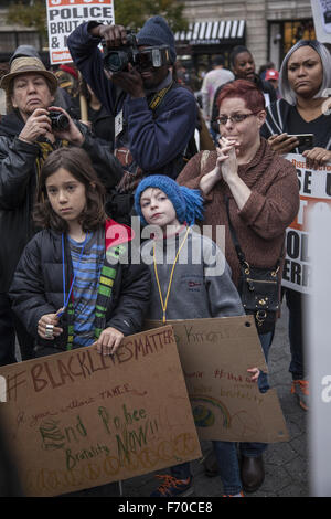 New York, USA. 22nd November, 2015. Children's March to bring more attention to police shootings of children on the 1 year anniversary of the killing by police of 12 yr. old Tamir Rice in Cleveland, Ohio. He had a toy gun. Police have not yet been charged with anything one year after the incident. Credit:  David Grossman/Alamy Live News