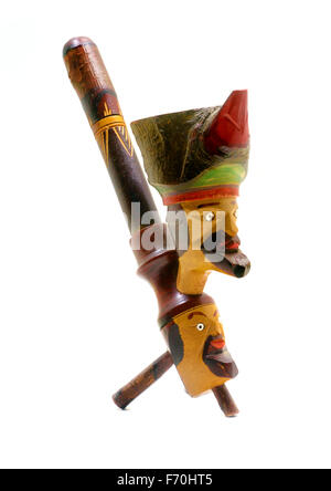 Hand carved wooden folk art smoking pipe Stock Photo
