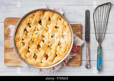 Homemade Dutch apple pie on a rustic table. Photographed from directly above. Stock Photo