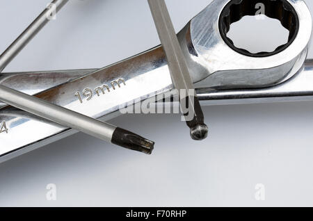 Wrench with ratchet function and ubraco and torx tool isolated on white background Stock Photo