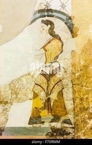 Santorini. Museum of Prehistoric Thera. Minoan wall painting fragment showing woman walking with arms outstretched, from the House of the Ladies ruin. Stock Photo