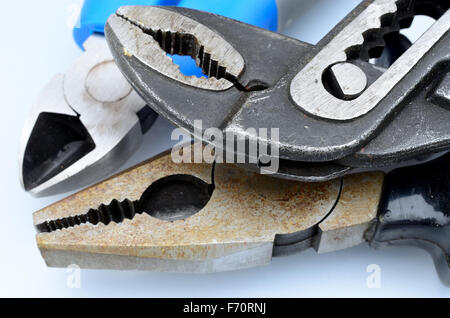 different pliers on white background Stock Photo