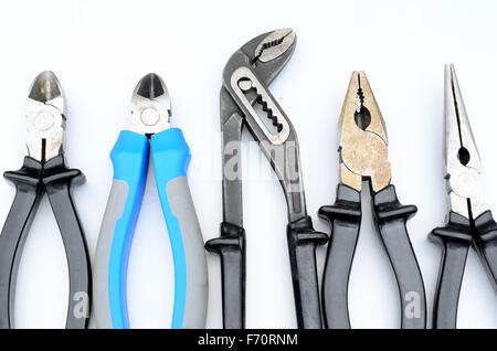 different pliers on white background Stock Photo