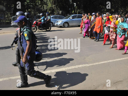 Dhaka, Bangladesh. 23rd Nov, 2015. Bangladeshi activists attend a rally against a countrywide strike enforced by Jamaat-e-Islami party in Dhaka, Bangladesh, Nov. 23, 2015. Bangladeshi largest Islamist party Jamaat-e-Islami called for the countrywide strike to protest the execution of its Secretary General Ali Ahsan Mohammad Mujahid for crimes against humanity in 1971. Credit:  Shariful Islam/Xinhua/Alamy Live News Stock Photo