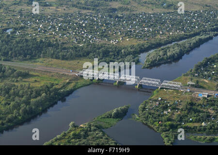 Neighborhoods of Kovrov from the air, railway bridge over the river Klyazma. Vladimir region, Russia Stock Photo