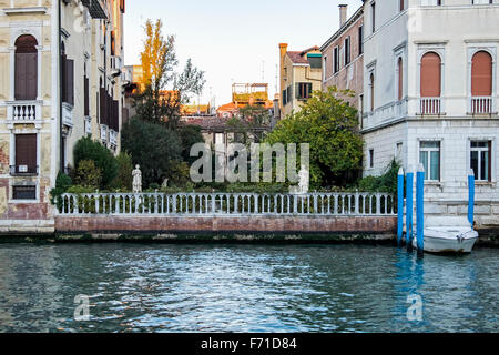 Italy, Venice, Grande Canale, canal-side garden and sculptures of the Palazzo Cappello Malipiero Barnabo Stock Photo