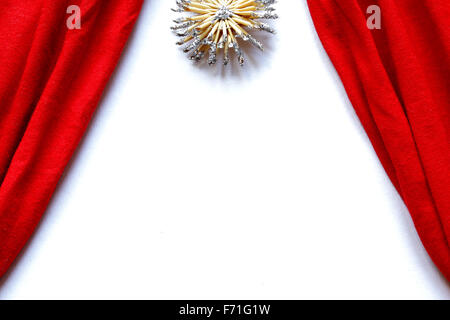 red curtains theatre stage white background polar star above Stock Photo