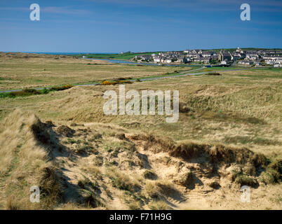 looking over Aberffraw dunes to the village and The River Ffraw, Anglesey, North Wales, UK Stock Photo