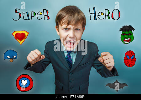 Teen boy businessman clenched fists and shouts opened his mouth Stock Photo