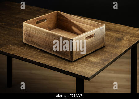 Empty rustic wooden box on the table Stock Photo