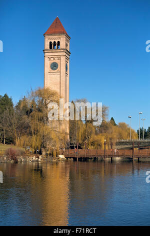 WA12107-00...WASHINGTON - The Clock Tower reflecting in the Spokane River in Spokane's Riverfront Park. Stock Photo