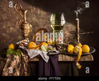 Still life composition with roemer glass and lemons Stock Photo