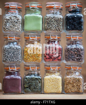 Superfoods in jars pattern. Pollen, seeds, powder and dried fruit pattern Stock Photo