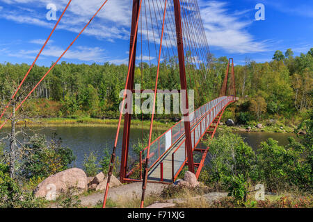 The Great Trail suspension bridge over the Whiteshell River, Whiteshell Provincial Park, Manitoba, Canada. Stock Photo