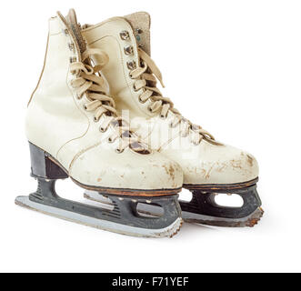 Old white ice skating shoes and blades isolated on white background - stock image. Vintage ice skates. Stock Photo