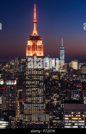 Top view of the Empire State Building with orange lights, Manhattan, New York, USA Stock Photo