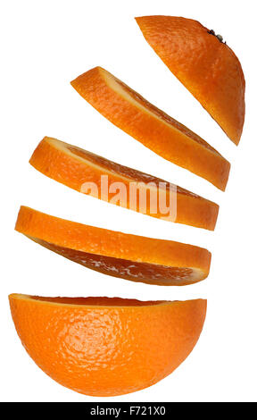 Orange with floating slices Isolated on on white background with Clipping Path Stock Photo