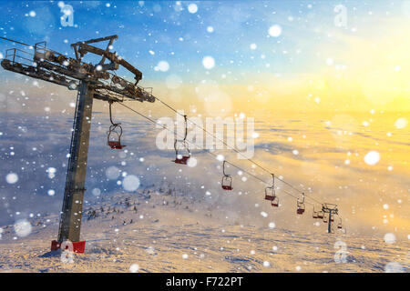 Ski lift on bright winter day, travel, cold Stock Photo