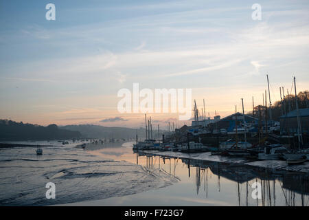 Sunrise over the Fal River at low tide - viewpoint from Jubilee Wharf, Penryn, Cornwall Stock Photo