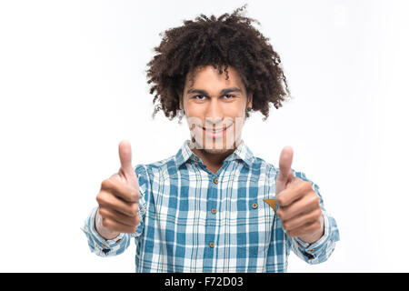 Portrait of a smiling afro american man with curly hair showing thumbs up isolated on a white background Stock Photo