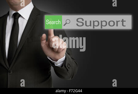 Support browser is operated by businessman concept. Stock Photo