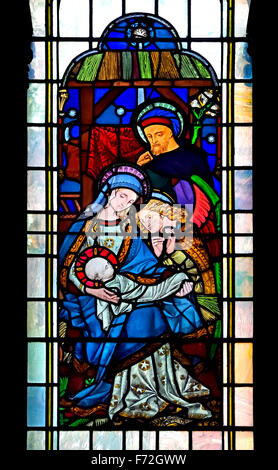 London, England, UK. Parish Church of St Michael Cornhill. Stained Glass Window showing nativity scene Stock Photo