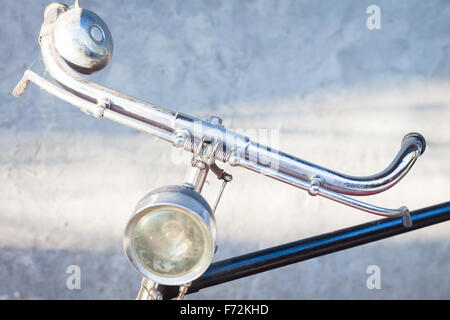 Vintage bicycle handlebars with gray background, stock photo Stock Photo