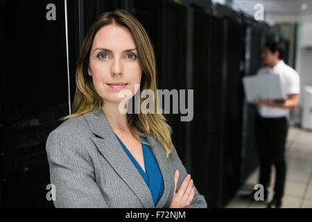 Confident technician looking at camera Stock Photo