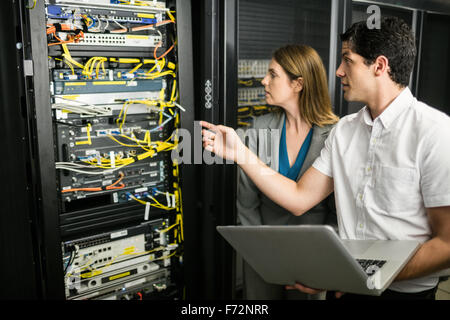 Team of technicians working together Stock Photo