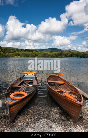Two rowing boats moored on Derwent Water, near the Keswick landing stage, Keswick, Lake District, Cumbria, England, UK