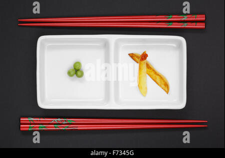 Peas ,Potato Chips and Chopsticks Stock Photo