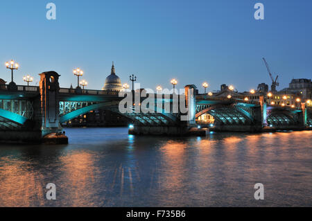 Southwark Bridge London UK floodlit at night Stock Photo