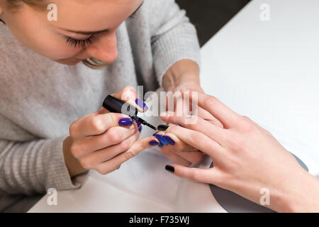 Step manicure process nail covering gel polish Stock Photo