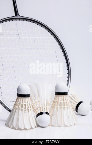 shuttlecock on badminton racket. Stock Photo