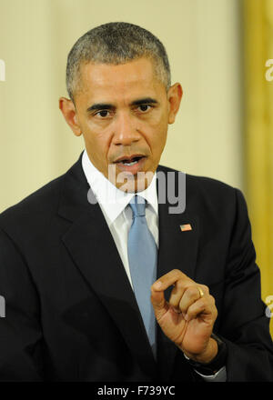 Washington, DC, USA. 24th Nov, 2015. U.S. President Barack Obama attends a press conference in Washington, DC, the United States, on Nov. 24, 2015. U.S. President Barack Obama and his French counterpart Francois Hollande on Tuesday urged Russia and Turkey to avoid escalation after a Russian warplane was downed by Turkey. Credit:  Bao Dandan/Xinhua/Alamy Live News Stock Photo