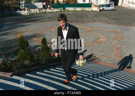bride with a bouquet in hands Stock Photo