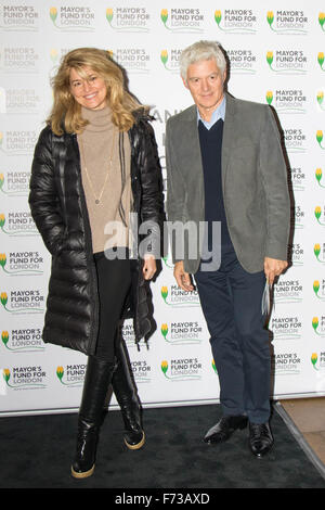 Halcyon Gallery, London, November 24th 2015. Mayor of London Boris Johnson joins celebrities and business leaders at Mayfair’s Halcyon Gallery where pictures from a book showcasing London’s true colours will be sold to raise money for the Mayor’s Fund For London, which helps disadvantaged youths gain a foothold on the employment ladder. PICTURED: Celebrity hairstylist John Frieda with partner Avery Agnelli. Credit:  Paul Davey/Alamy Live News Stock Photo