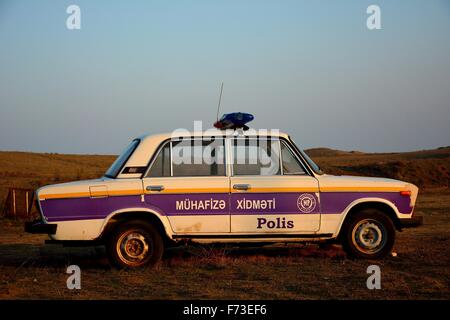 Old Lada police car in Azerbaijani countryside Stock Photo