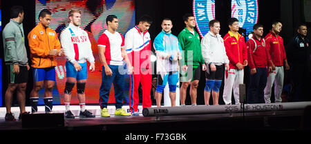 Houston, Texas, USA. 24th Nov, 2015.  The Men's 77 kilogram class stands to be recognized in the traditional introductions ceremony at the World Weightlifting Championships in Houston, Texas. Brent Clark/Alamy Live News Stock Photo